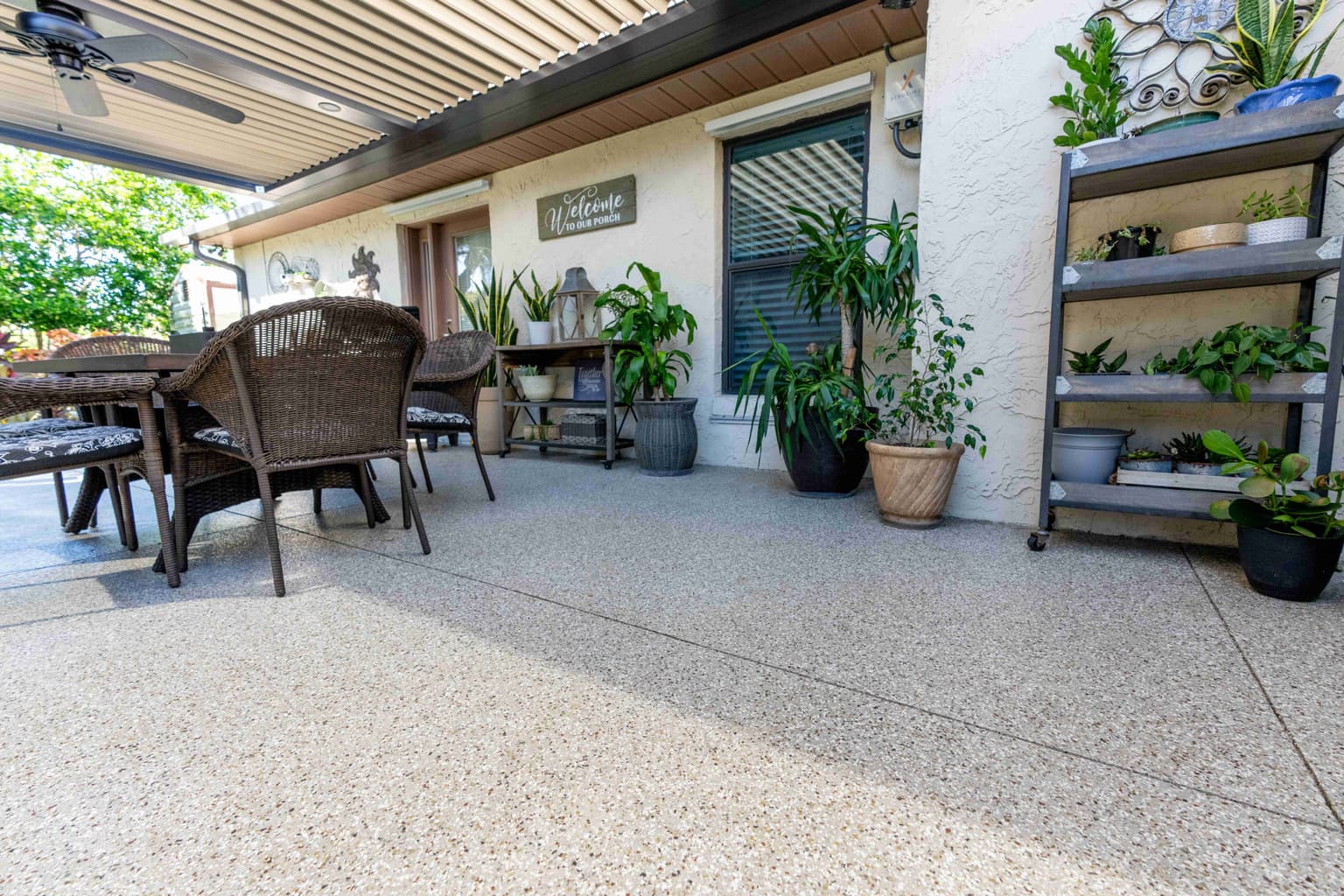 Modern covered patio with polished concrete flooring